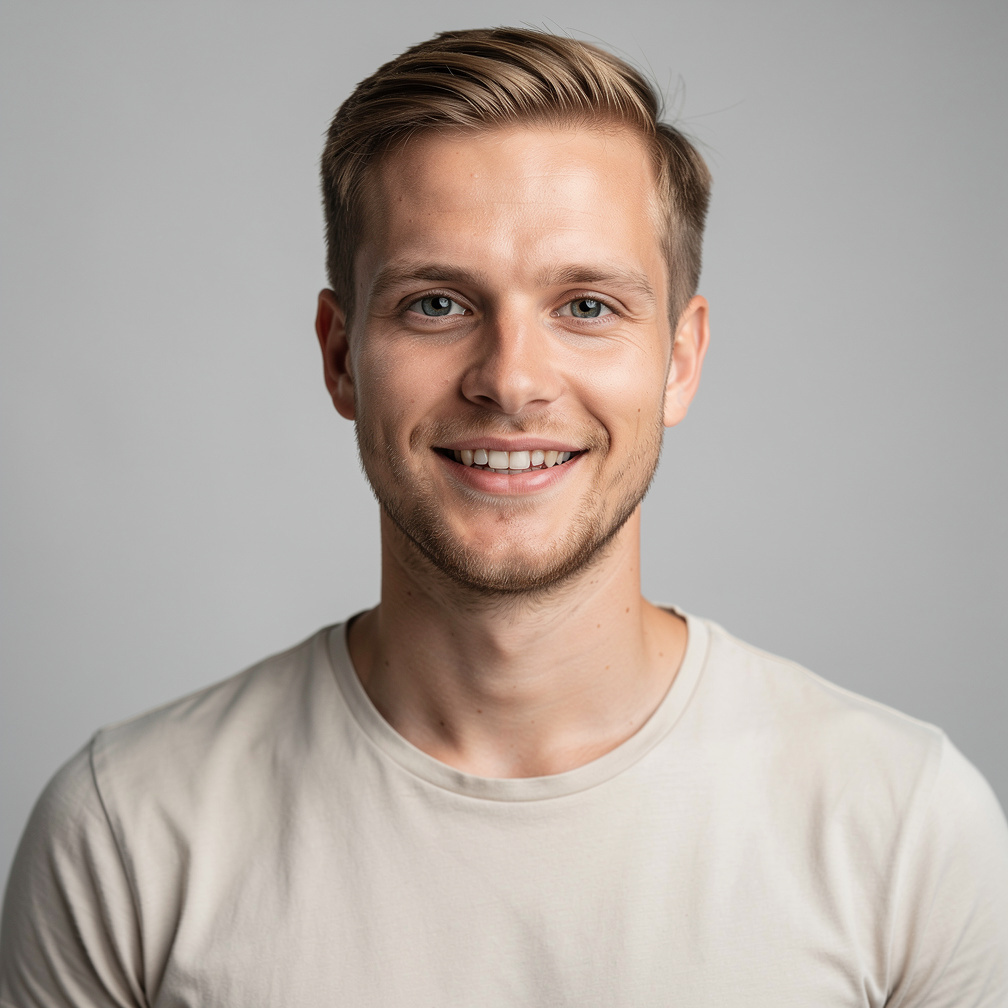 Studio portrait of a young Danish male photo editor