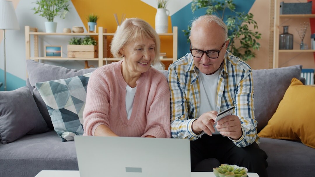 elderly couple discussing finances
