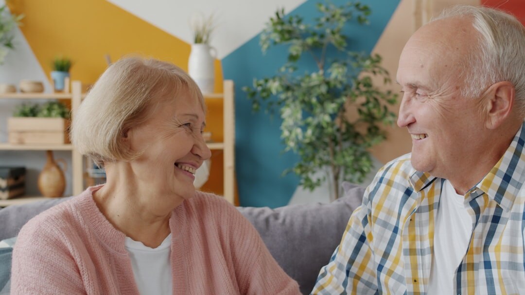 elderly couple discussing finances